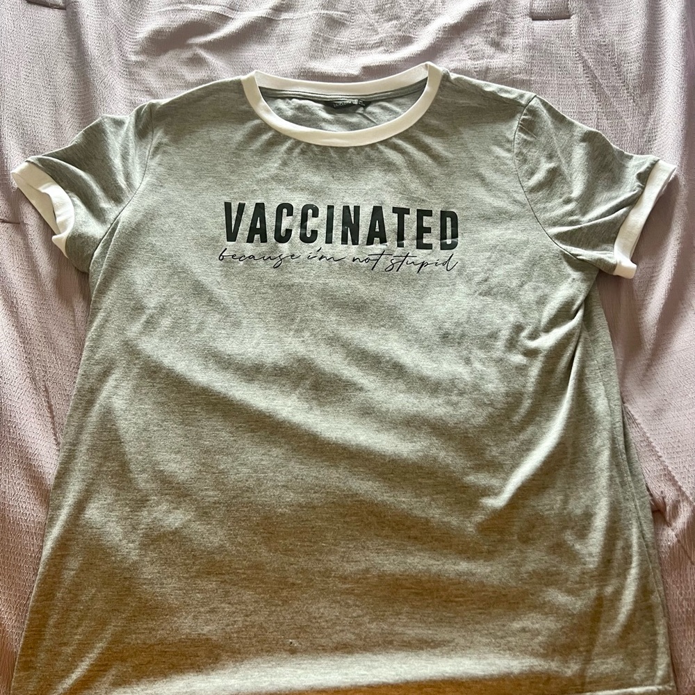 NWOT Light Gray “Vaccinated Because I’m Not Stupid” T-Shirt W/White Collar.